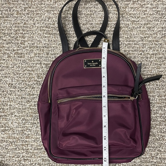 Kate Spade Burgundy Backpack with Black Straps
